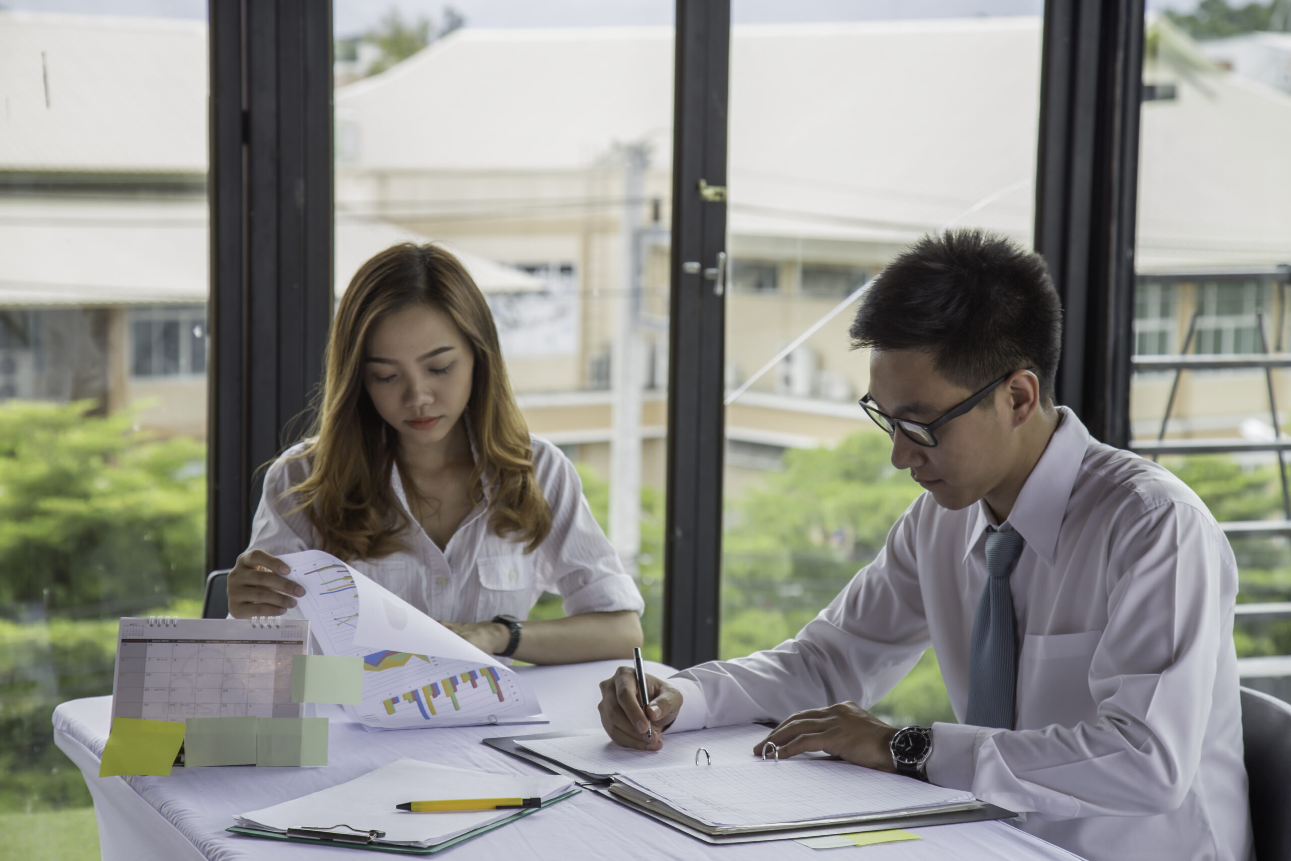 Businessman and Businesswoman work business planning, Teamwork for Success organization. Selective focus.