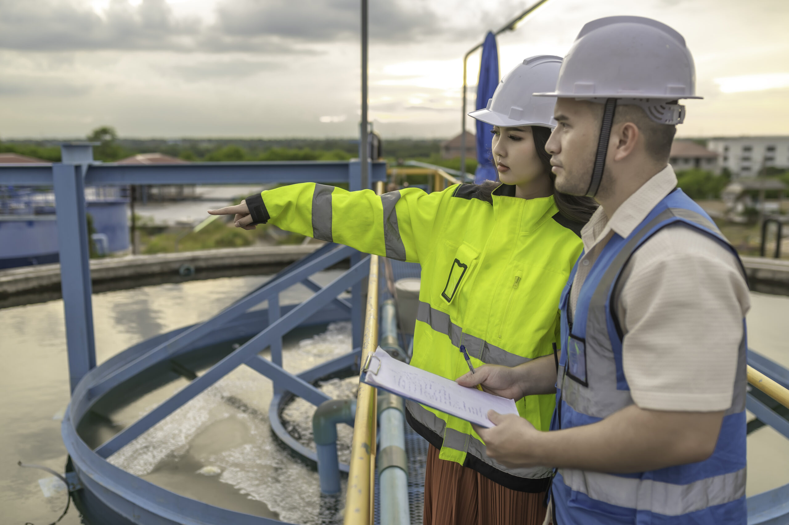 Environmental engineers work at wastewater treatment plants,Water supply engineering working at Water recycling plant for reuse
