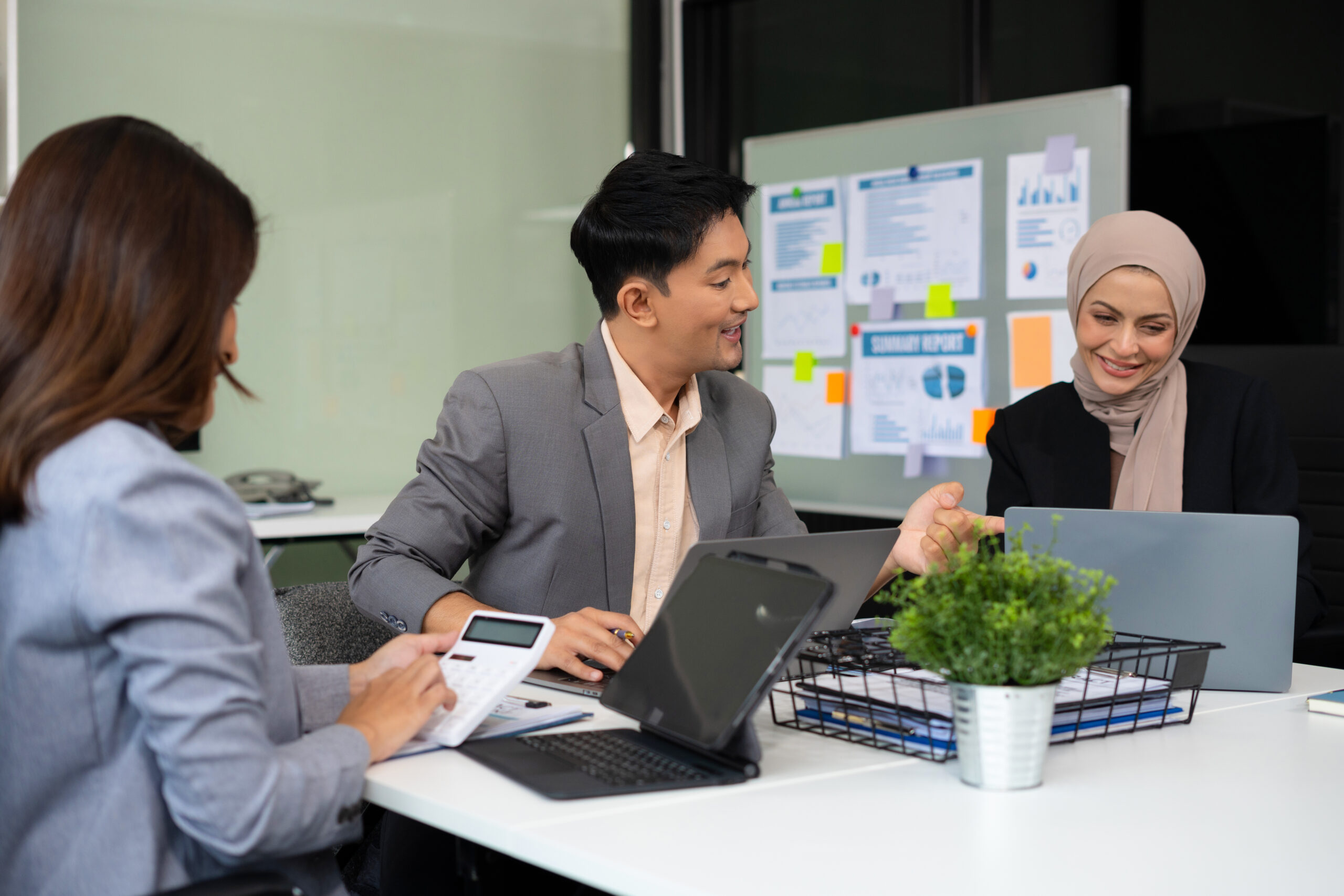 Business team meeting present.professional investor working with new startup project. Finance managers task.Digital tablet laptop computer design smart phone.